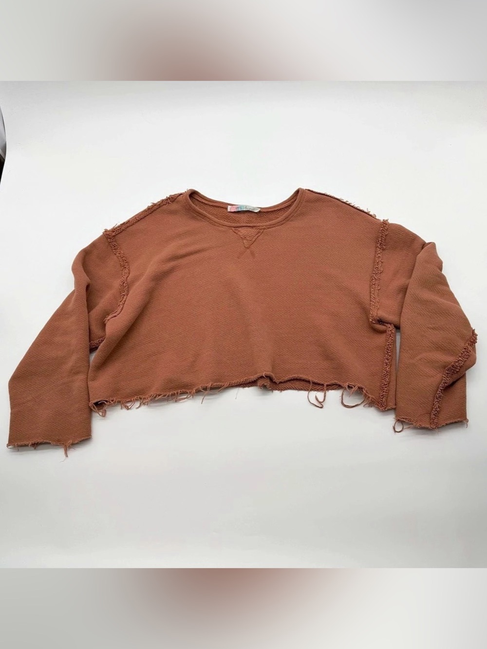 FP Beach Raw Edge Long Sleeve Top in Brown Size Medium